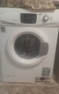 لباسشویی  ۷کیلو ۱۲۰۰دورصددرصد خشگ کن