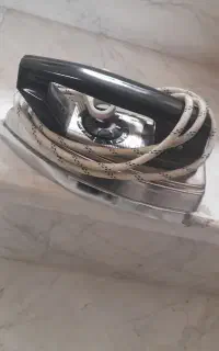 اتو سنگی وتلفن رومیزی