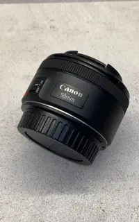 لنز کنون فیکس 50mm f1.8 STM مشابه نو
