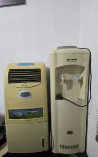 یک عدد کولر و بخاری ایستاده وآب سرد وگرم کن