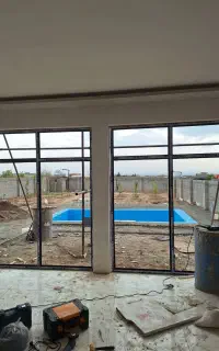 تولید و تعمیر و رگلاژ و نصب انواع پنجره های UPVC