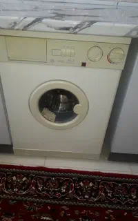 چرخ خیاطی ساعت دیواری چوبی