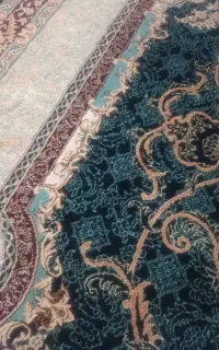 فرش سورمه ای دوازده یانه متری