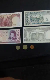 اسکناس های قدیمی تا نخورده و سکه های خارجی