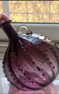 بطری شیشه ای در دار