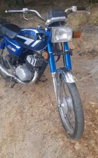 سوزوکی ax100