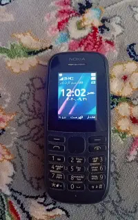 گوشی نوکیا ساده همراه شارژر