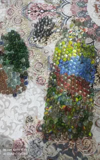 تیله شیشه‌ای بازی