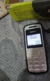 گوشی ساده نوکیا و کاجیتل.