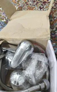 شیرآلات اهرمی بهمراه شیلنگ فنری سرویس بهداشتی