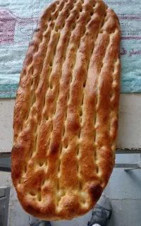کارگر تافتون پزی