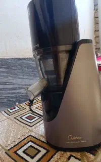 عصار گیر و آب میوه گیری