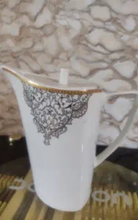 چهار عدد پارچ چینی در دار