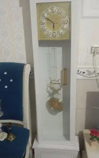 ساعت ایستاده و تابلوفرش