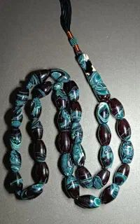 تسبیح کهربا سیاه رگه‌آبی