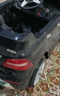 ماشین شارژی  (سالم نو موزیکال دوموتوره )