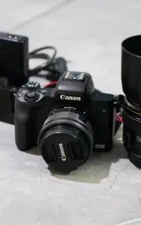 کنون m 50 مارک 2  به همراه لنز اضافه