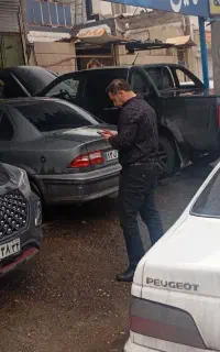 گارگیری و نشت یابی کولر برق و تنظیم موتور خودرو