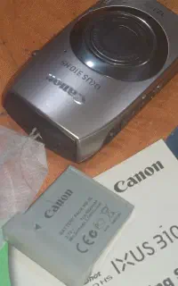 دوربین دیجیتالی لمسی canon lxus310 HS