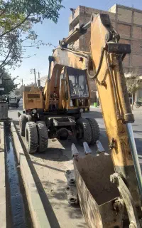 بیل مکانیکی کوماتسو۱۰۰ لاستیکی