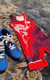 لباس کشتی سایز 2 دوبندش وسایز 33 کفش