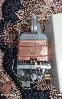 یک عدد آبگرمکن دیواری بوتان B3315فن دار خشک