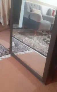 اینه با قاب خوشرنگ