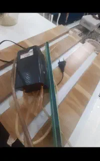 شیشه اکواریوم و پمپ هوا