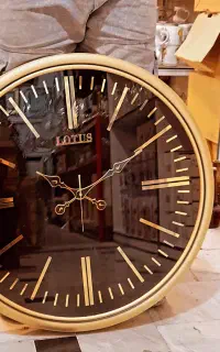ساعت های دیواری لوتوس طلایی اک