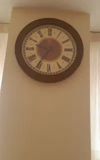ساعت دیواری عقربه روان گرد