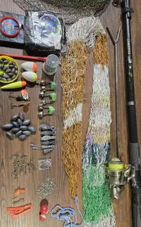 لنسر.چوب وچرخ ماهی گیری