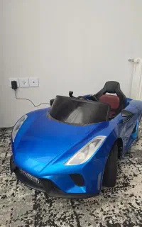 ماشین شارژی فراری آبی رنگ