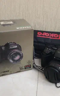دوربین عکاسی - فیلمبرداری FUJIFILM و سه‌پایه عکاسی