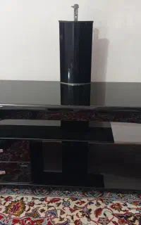 یک عدد زیر تلویزیون شیشه ای کشو دار