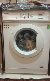 لباس شویی ایسال