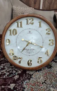 ساعت دیواری عقربه ای