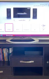 تلوزیون اسمارت ۴۲ LG+به همراه میز تلوزیون