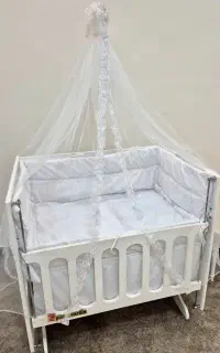 تخت نوزاد گهواره ای و کریر در حد نو(رامهرمز)