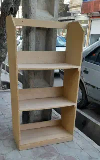 قفسه کتاب وغیره ومیز تلویزیون همگی سالم