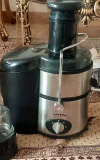 آبمیوه گیری سه کاره استیل