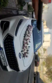 ماشین عروس  از ۶۰۰ تاج گل ترحیم از ۵۰۰