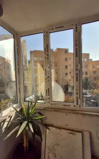 درب و پنجره دوجداره توری شیشه آیینه