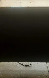 تلوزیون  و کارتن تلوزیون ۶۵ اینچ