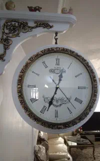 ساعت دیواری دو طرفه