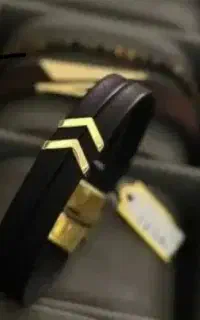 دستبند چرم و طلا