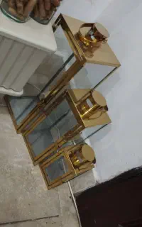 لوازم خانگی.قفس پرنده کنار سالنی ایستاده حراج