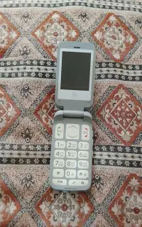 گوشی کتابی fly اصل در حد نو