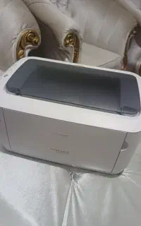 پرینتر لیزری کانن lbp6030 همراه ۲عدد کارتریج اضافه