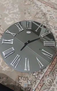 ساعت دیواری گرد اینه ای