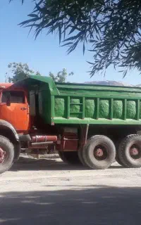 مایلر کمپرسی و بیل مکانیکی بزرگ